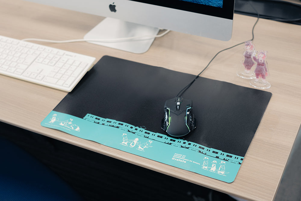 "A manga where the wolf just drives a train" gaming mouse pad